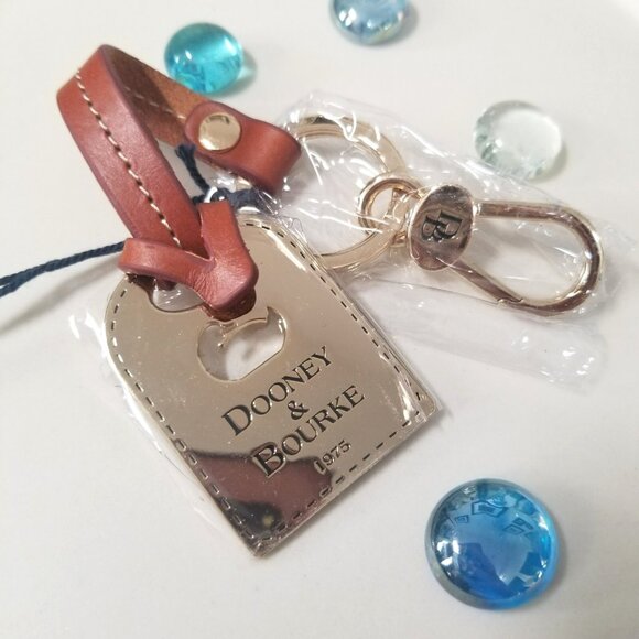 Dooney & Bourke Luggage Tag Key Fob Gold Tone Leather Trim Cut Out Duck Key Ring - Picture 1 of 8